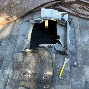 Chimney removal and roof patch